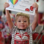 (Accepting his certificate after the program.)